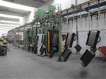 Cogeim Continuous feed  pass-through  hanging load type shot blasting machine - GTU Series Shotblasting Machines 